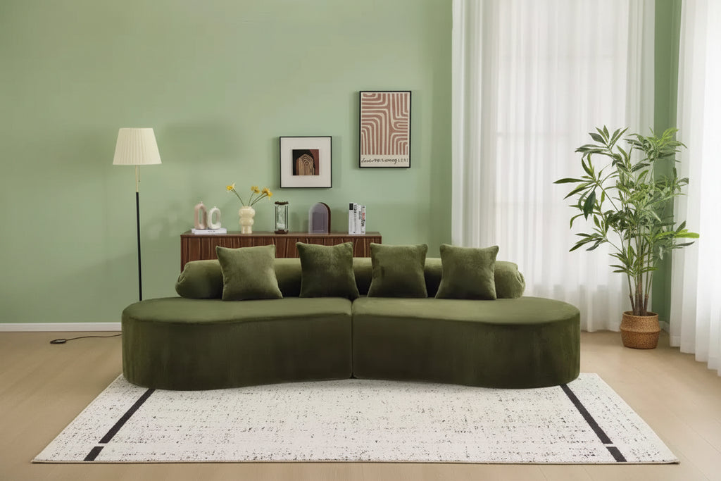 Modern and simple curved flannelette sofa. Creative multi-seater for the living room, with a combination of pillows.